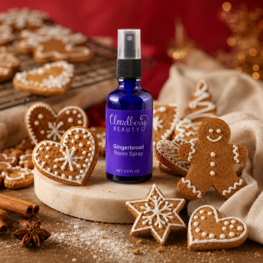Cloudberry Beauty Gingerbread Room Spray surrounded by decorated gingerbread cookies and warm holiday spices.
