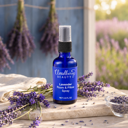 Cloudberry Beauty Lavender Room and Pillow Spray on stone surrounded by fresh lavender.