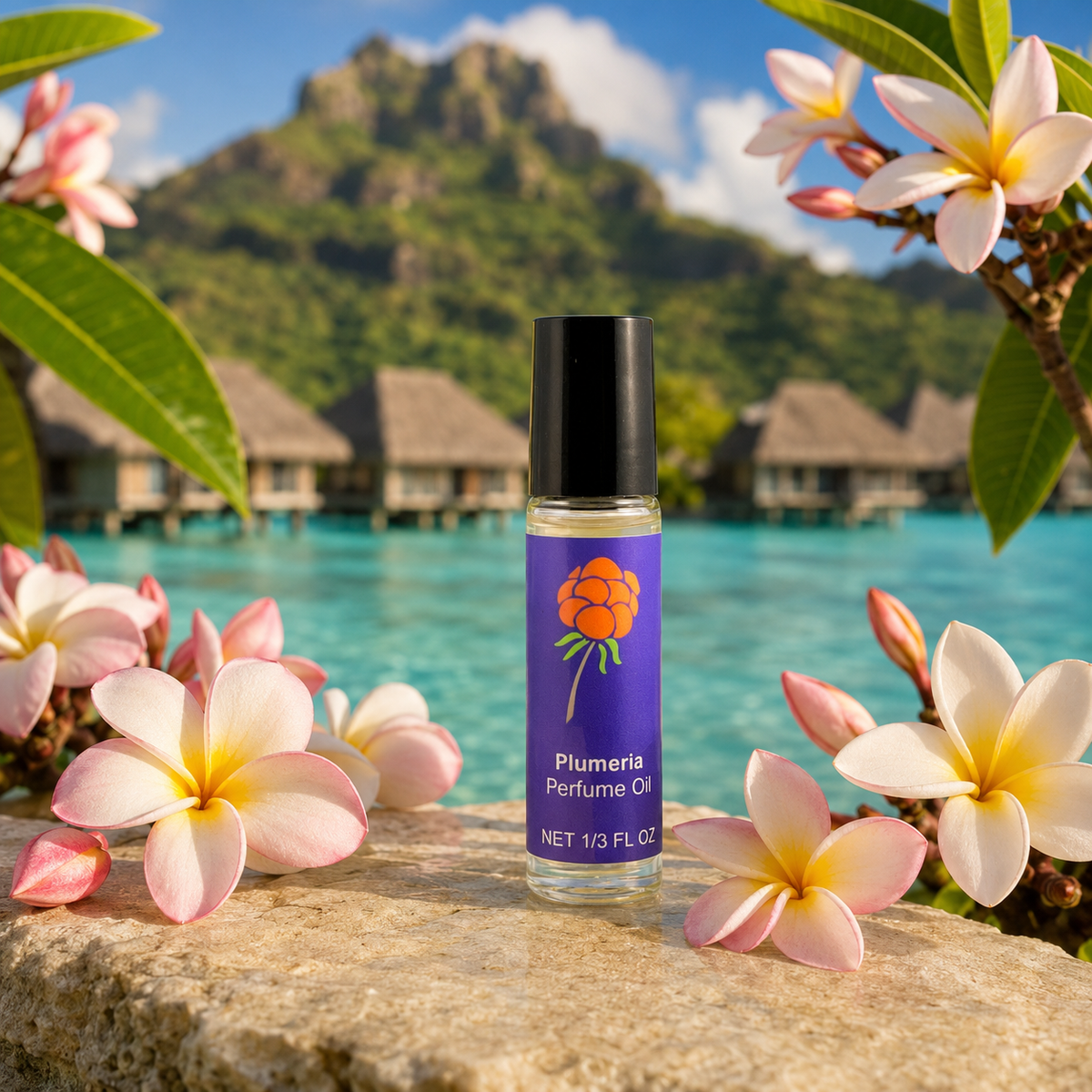 Cloudberry Beauty Plumeria Perfume Oil displayed with plumeria flowers beside a turquoise tropical lagoon.